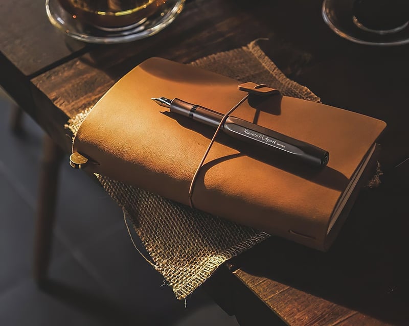 Notebook with pen for journaling